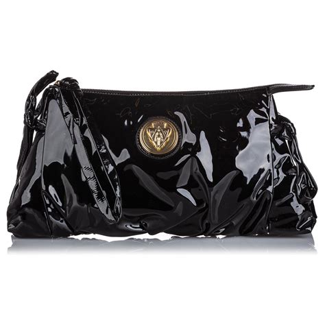 gucci black patent clutch with silver buckle|gucci hysteria clutch.